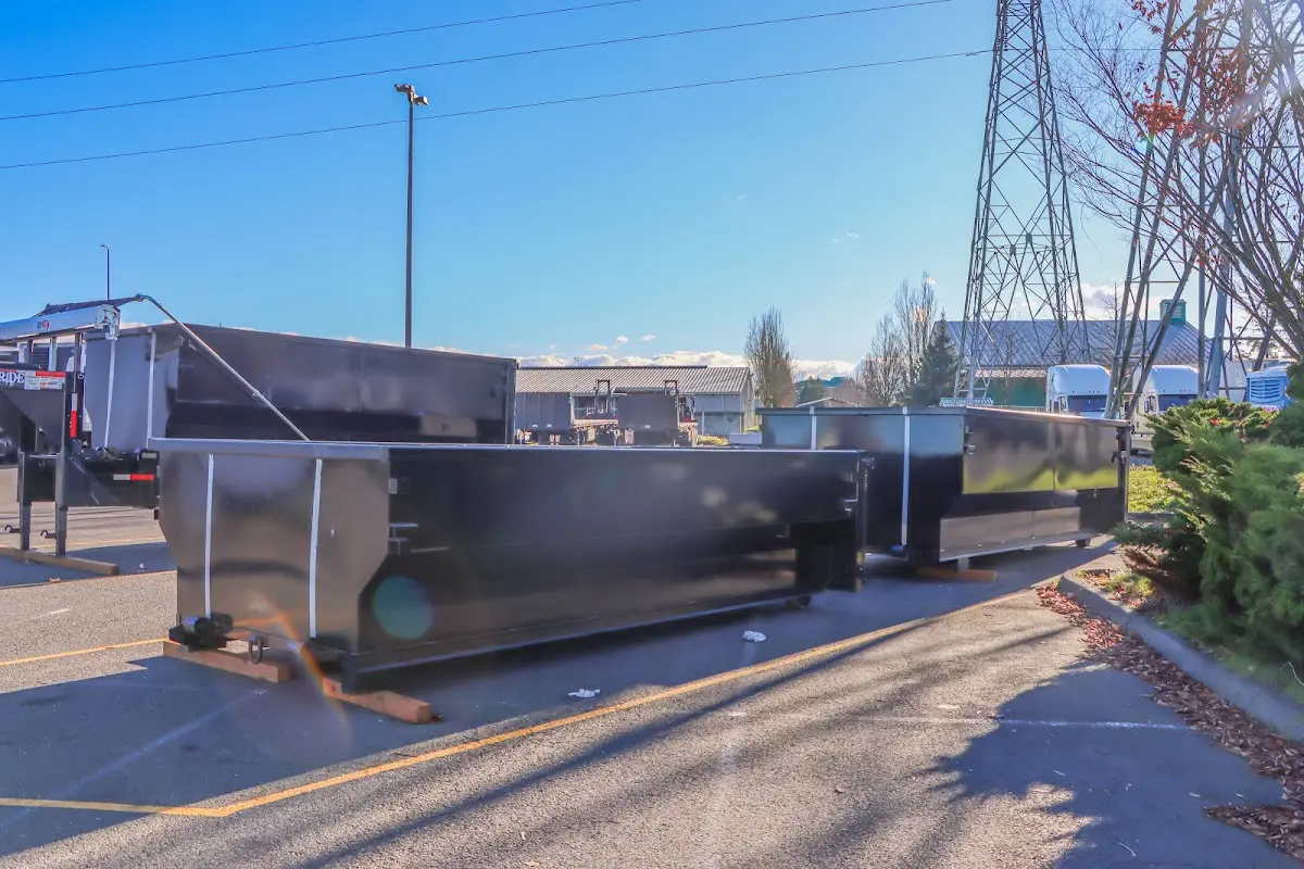 Roll-off dumpster ready for waste disposal at job site for Concrete Dumpster Rental in Berkley